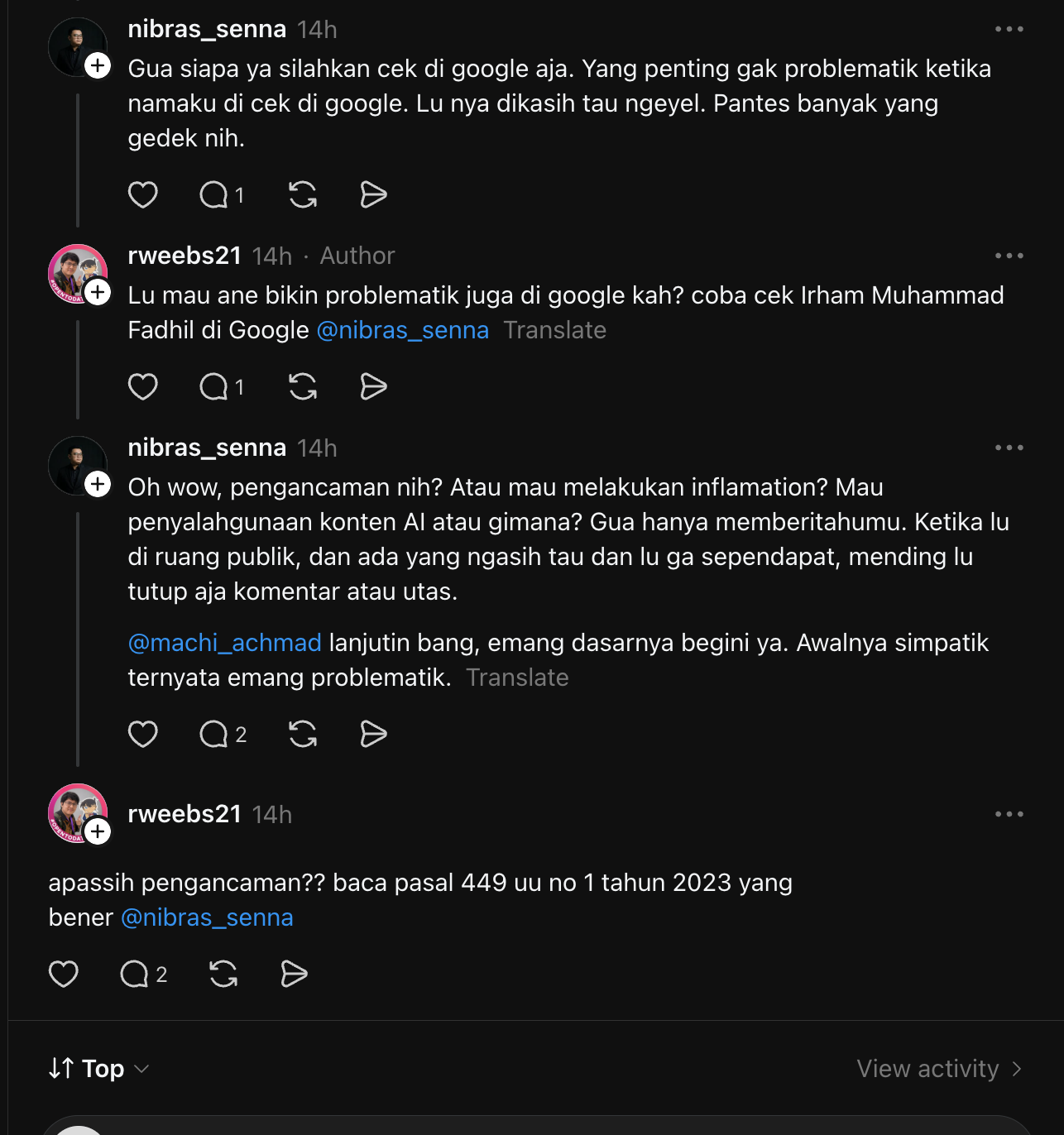A public Threads exchange in which Arif Kautsar Nibras Senna asked whether Rahmat Wibowo's statement was a threat or defamation