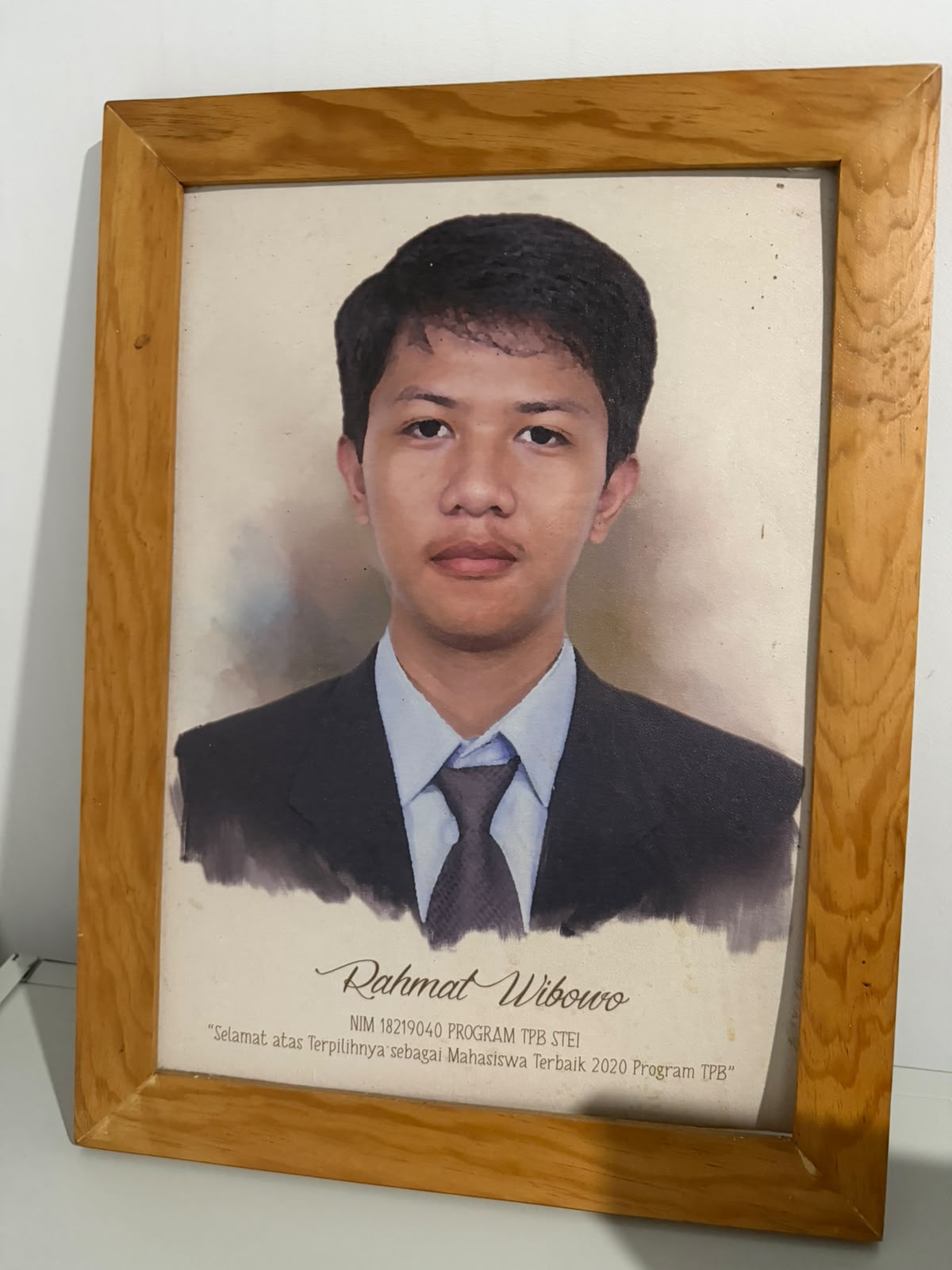 Framed portrait recognizing Rahmat Wibowo as Mahasiswa Terbaik 2020 Program TPB